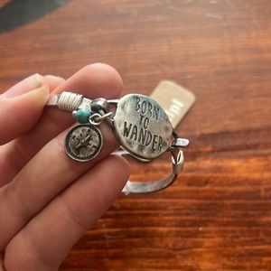 Brand new silver “Born to Wander” bangle bracelet